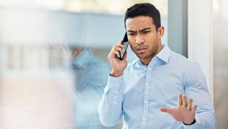 Phone call, stress and confused business man in office with problem, error and mistake for online discussion. Corporate, frustrated and person on smartphone for contact, talking and communication