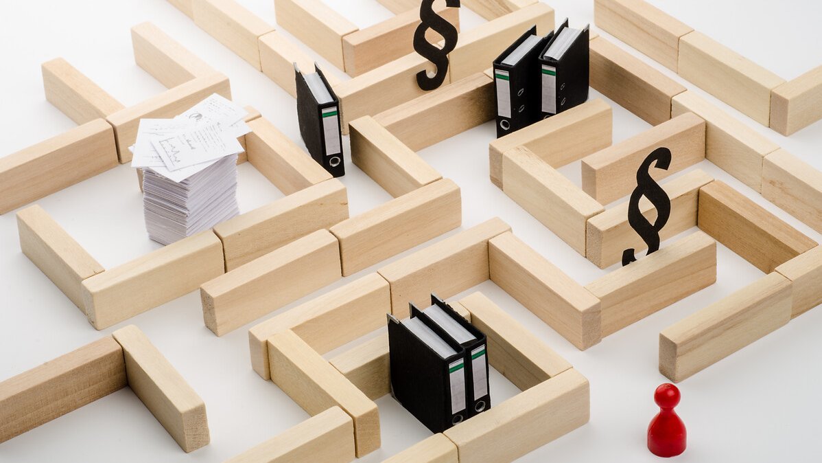 Concept - figure in the bureaucracy jungle