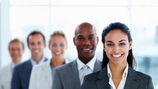 Businesswoman colleagues standing in a line and smiling