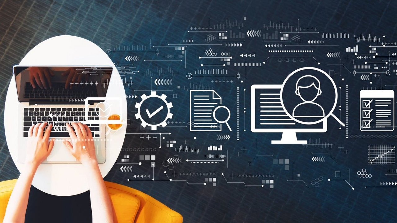 Document management system concept with person using a laptop