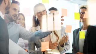 Creative business people working on business project in office