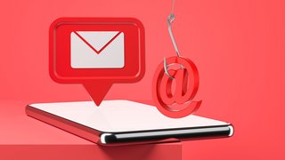 Smartphone with red new mail or message  notification on the red table. Social network communication and text messengers concept. Vertical frame with copy space.